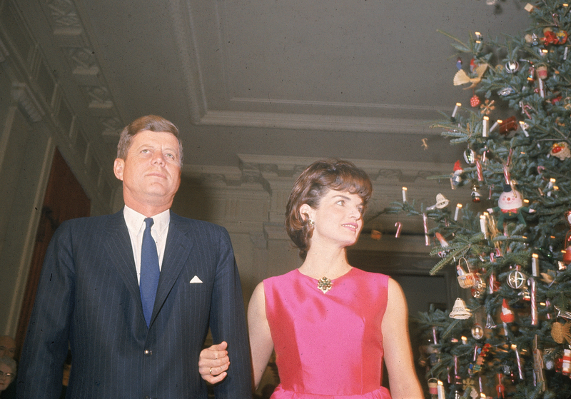 Illustration for article titled 70 Years of First Ladies Standing in Front of Christmas TreesÂ